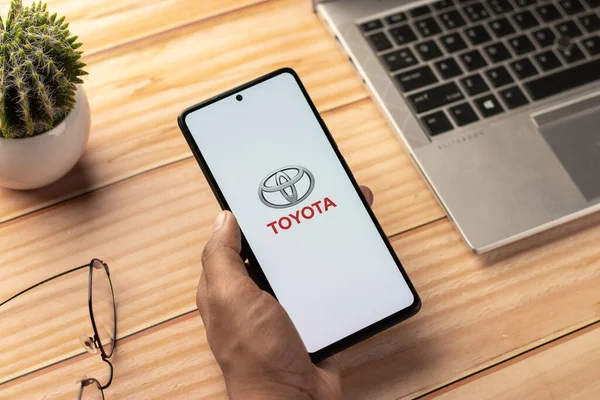 West Bangal, India - April 20, 2022 : Toyota on phone screen stock image.