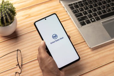 West Bangal, India - April 20, 2022 : United Steel Corporation on phone screen stock image.