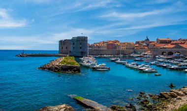 The Ploce gate harbor area creates a beautiful scene on a sunny summer day in Old Town Dubrovnik