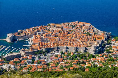 Blue waters of the adriatic frame Old Town Dubrovnik as viewed from the top of Mt. Srd.