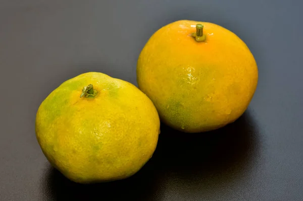 photos of fruits on a black background.