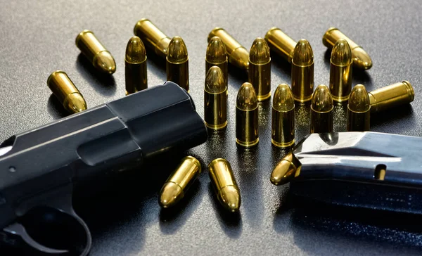 Photo Black Pistol Bullet — Stock Photo, Image