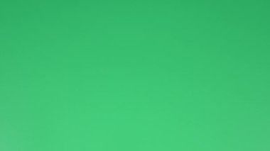 Yeşil arkaplan üzerine çok sayıda not kağıdı - Hareketi Durdur Canlandırması.