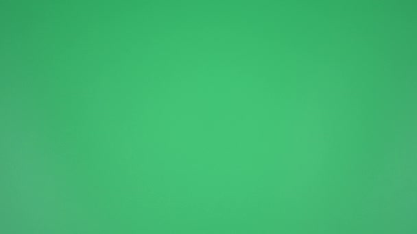 ストップモーションアニメーションペーパーしわ緑の画面 — ストック動画