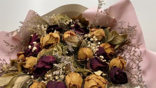 Romantic Composition Dried Flowers Dried Roses Slow Motion White Background — Stockvideo