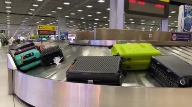 Baggage moving on belt at the airport.