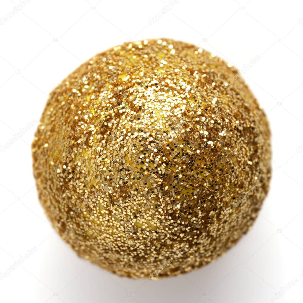 Ball covered with golden glitter isolated on white background