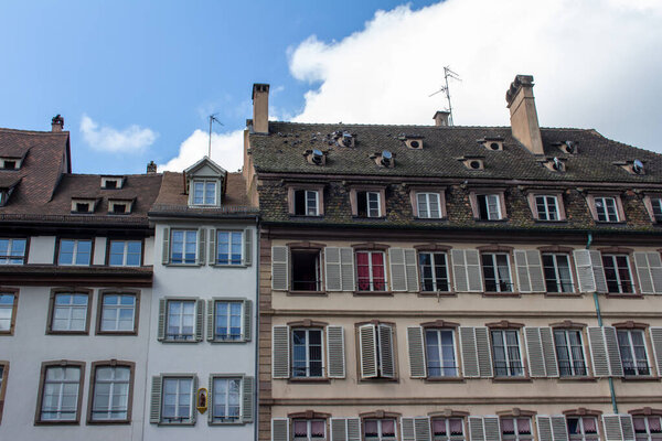 Close upward exterior texture background view of traditional French architecture in Strasbourg, France