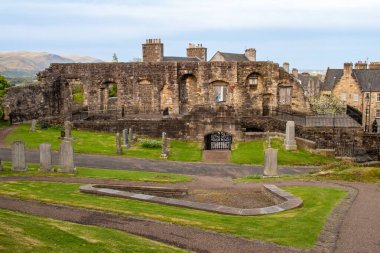 Scenic view of the cemetery grounds of the Church of The Holy Rude in Stirling, Scotland, at dusk with gravestone dating to the 16th century