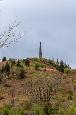 Scenic landscape view of Murray's Monument, a stone obelisk in rural Dumfries, erected in 1835 to honor a local shepherd boy who later became a professor at Edinburgh University