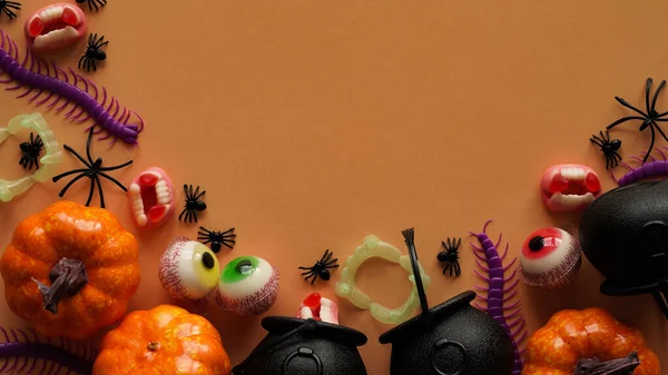 Pumpkins Cauldrons Pots Worms Jaws Spiders Candy Form Eyes Orange — Foto de Stock