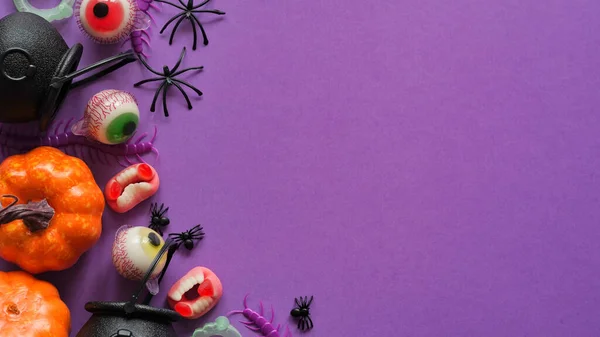 Pumpkins Cauldrons Pots Worms Jaws Spiders Candy Form Eyes Purple — Foto de Stock