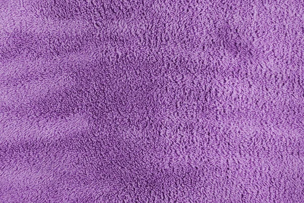 紫のカーペットや生地の質感の背景が近い — ストック写真