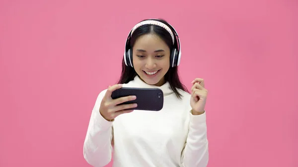 Asian Women Smiling Listening Singing Music Headphones Pink Studio Background — Photo