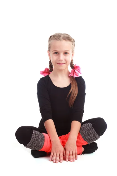 Маленькая девочка гимнастка — стоковое фото