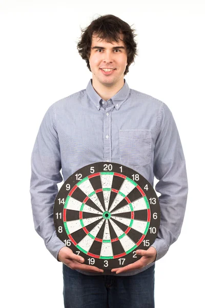 Man holding dartboard — Stock Photo, Image