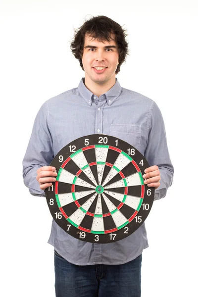 Man holding dartboard — Stock Photo, Image