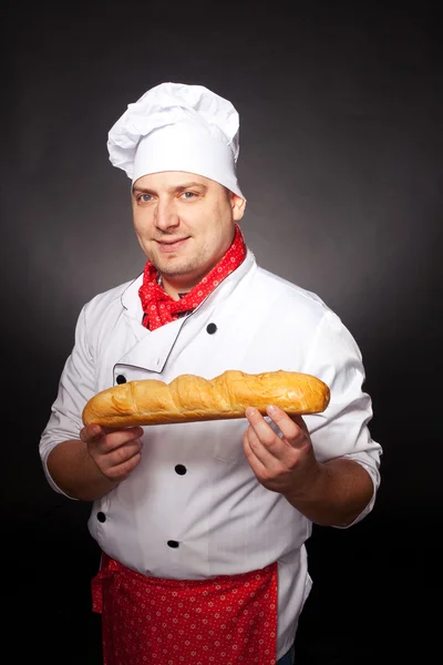 Panettiere con pane — Foto Stock