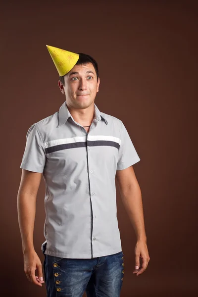 Birthday man in yellow cap — Stock Photo, Image