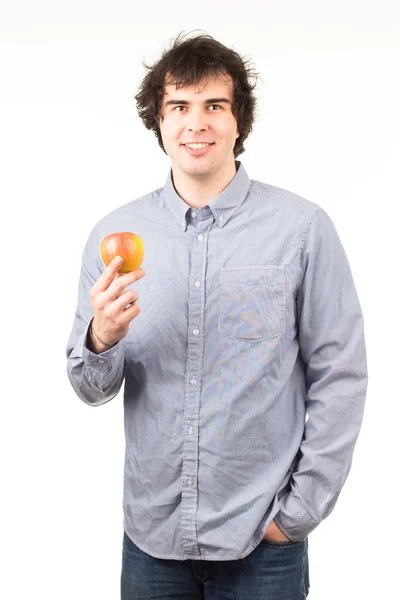 Muž hospodářství jablko — Stock fotografie