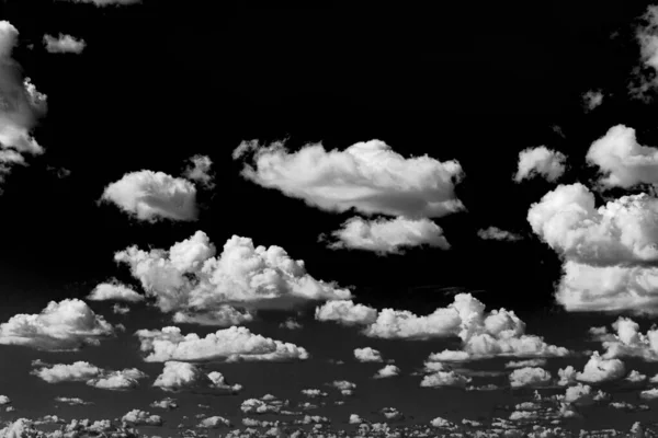 Real clouds and sky hi-res texture for design and retouch - abstract photo texture of the real clouds on the black background for adding and editing as a background layer in the Screen blending mode