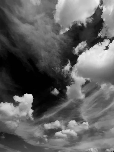 Real clouds and sky hi-res texture for design and retouch - abstract photo texture of the real clouds on the black background for adding and editing as a background layer in the Screen blending mode