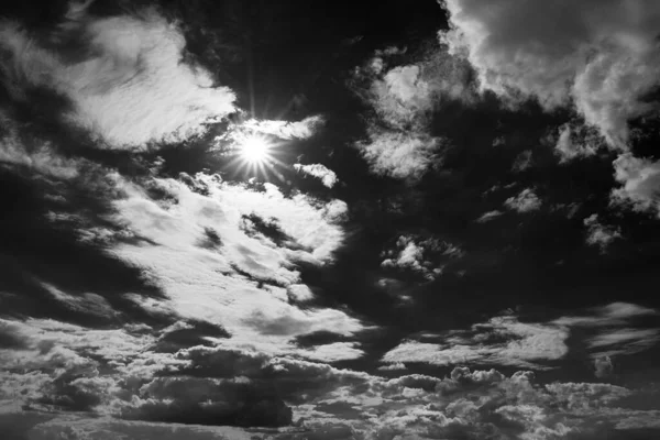 Real clouds and sky hi-res texture for design and retouch - abstract photo texture of the real clouds on the black background for adding and editing as a layer in the Screen mode