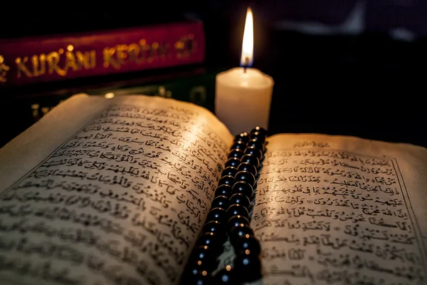 Quran Books And Candle — Stock Photo, Image