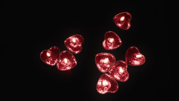 红心形状的蜡烛在黑色背景的水面上燃烧和移动 这个剪子很适合情人节的设计 — 图库视频影像