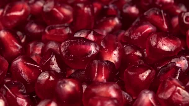 Pomegranate Seeds Macro Shot Shows Rotating Translucent Red Pomegranate Seeds — Stock Video