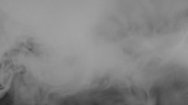 Smoke On The Black Background. Intensive smoke on the dark background.