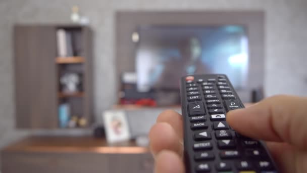Hand Using Remote Control Male Hand Using Remote Control Change — Stock Video