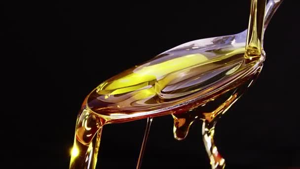 Olive Oil Pouring Spoon Black Background Slow Motion — Video