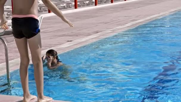 Side View Boy Diving Water While Resting Pool Sunny Day — ストック動画