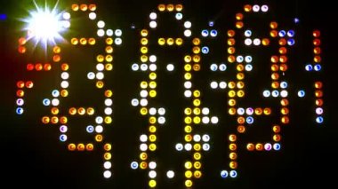 Light show on the stage. Real huge spot light panel taken with video camera.