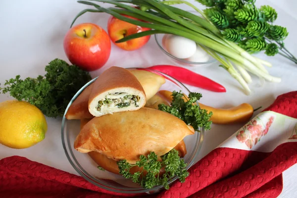 Pies with egg and spring onions — Stock Photo, Image