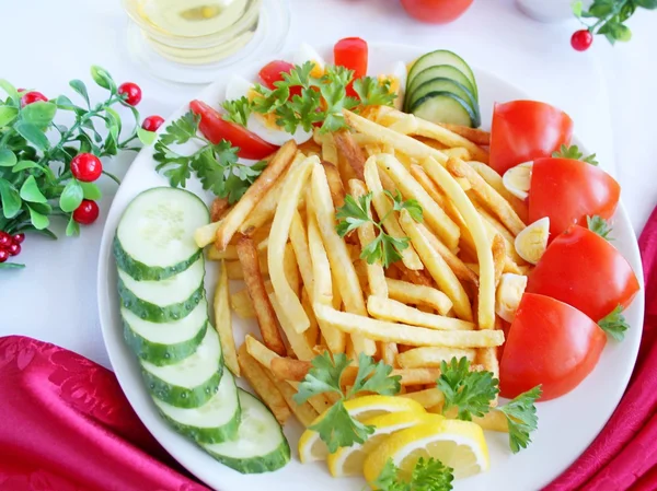 Fried potatoes and vegetables — Stock Photo, Image