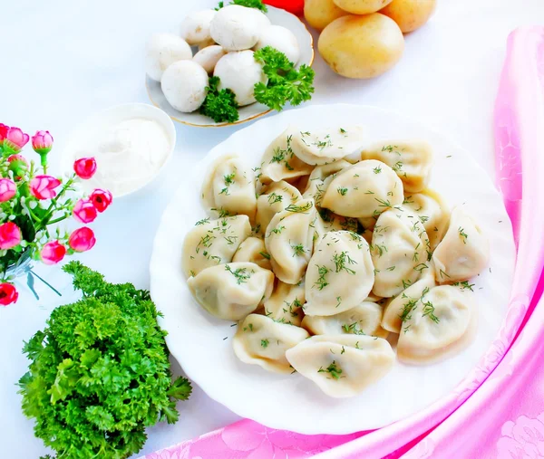 Vareniks with mush rooms and potatoes — Stock Photo, Image