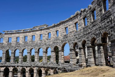 Pula, Croatia - 07 07 2022: Photography of ancient walls and architectural detail of arena in Pula from Roman period.