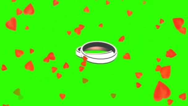 Rotating Wedding Rings Between Falling Hearts Green Screen Rotating Wedding Rings Between Falling Hearts Green Screen Stock Video