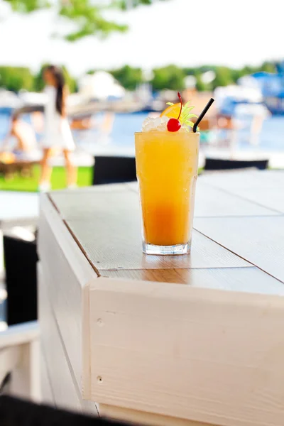 Cocktail with orange and cherry — Stock Photo, Image