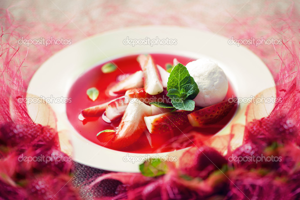 strawberry soup with ice cream and mint