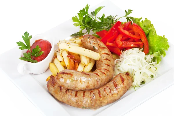 Grilled sausages with French fries, sauerkraut and sweet pepper — Stock Photo, Image