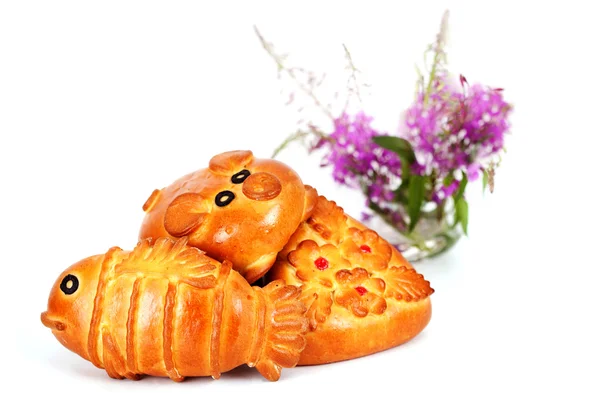 Three pie in the form of fish, pig, and a flower — Stock Photo, Image