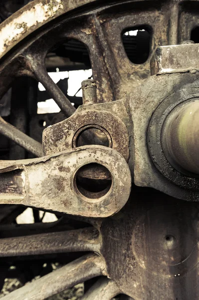 A wheel from an old style railway engine - steam locomotive. — Stock Photo, Image