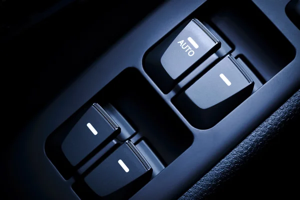 Car driver's and Passenger's front and rear windows switches. — Stock Photo, Image