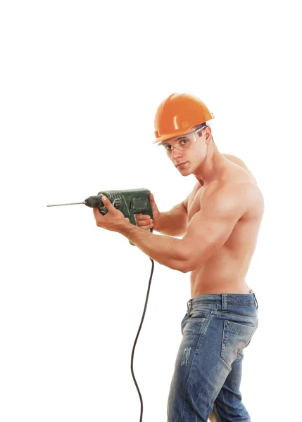 Muscular worker with a drill — Stock Photo, Image