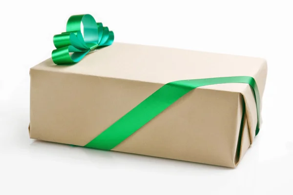 A gift box with a green ribbon — Stock Photo, Image