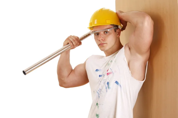 Trabajador de construcción cerca de pared — Foto de Stock