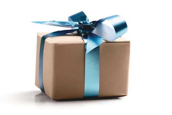 Gift with blue ribbons — Stock Photo, Image